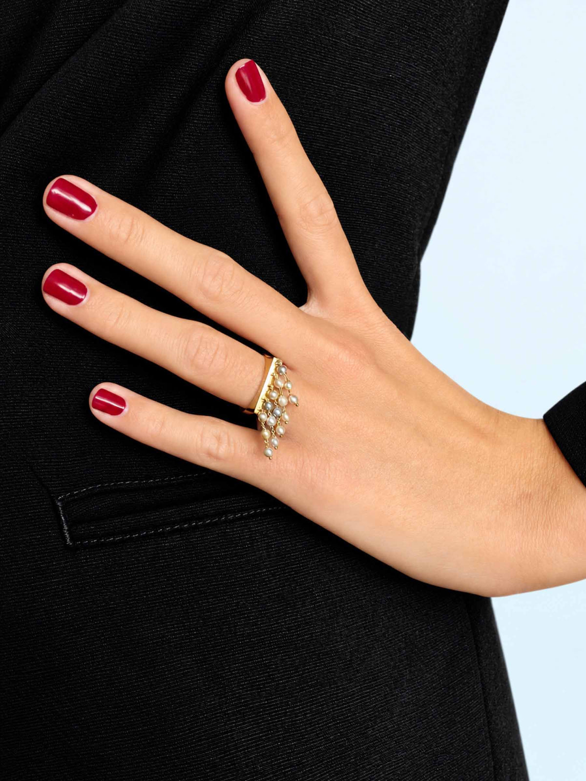 Handcrafted in 18-karat gold, the Shower Ring features cascading gold chains adorned with carefully selected Vietnamese Akoya pearls. Every pearl is chosen for its own unique shape, lustre and character, creating a ring that comes alive with every movement of your hand.