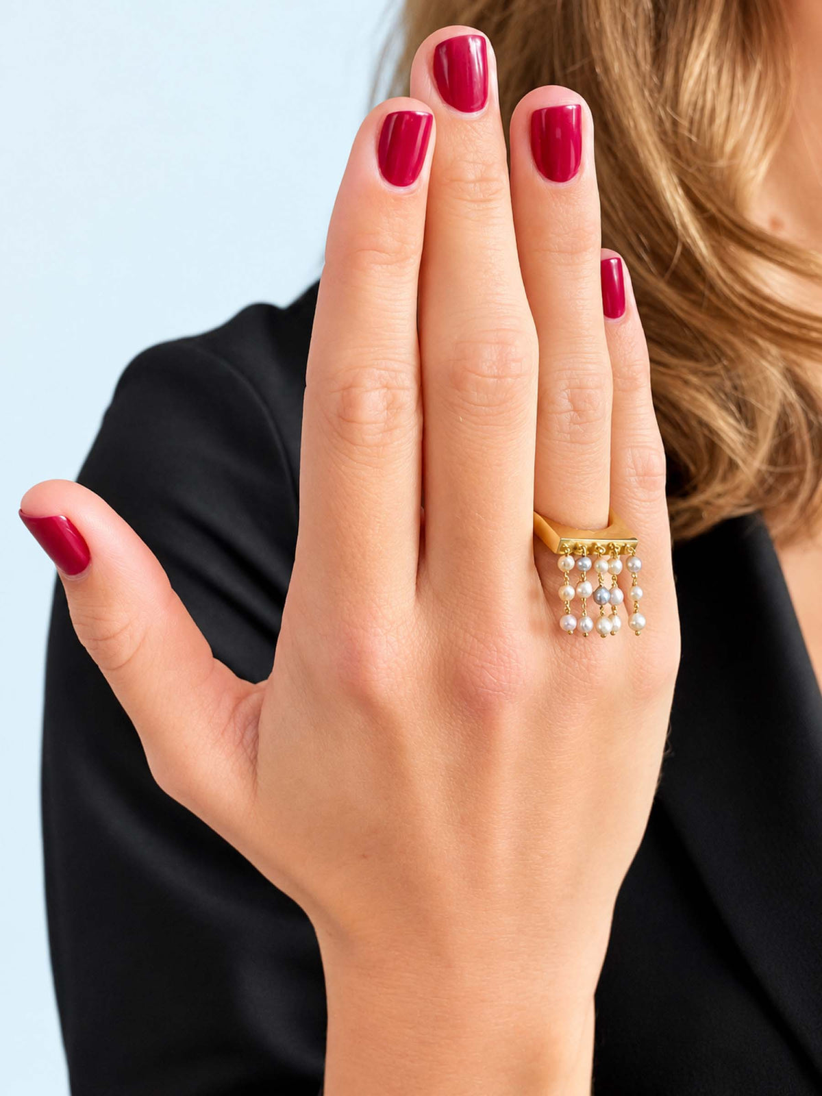 Handcrafted in 18-karat gold, the Shower Ring features cascading gold chains adorned with carefully selected Vietnamese Akoya pearls. Every pearl is chosen for its own unique shape, lustre and character, creating a ring that comes alive with every movement of your hand.