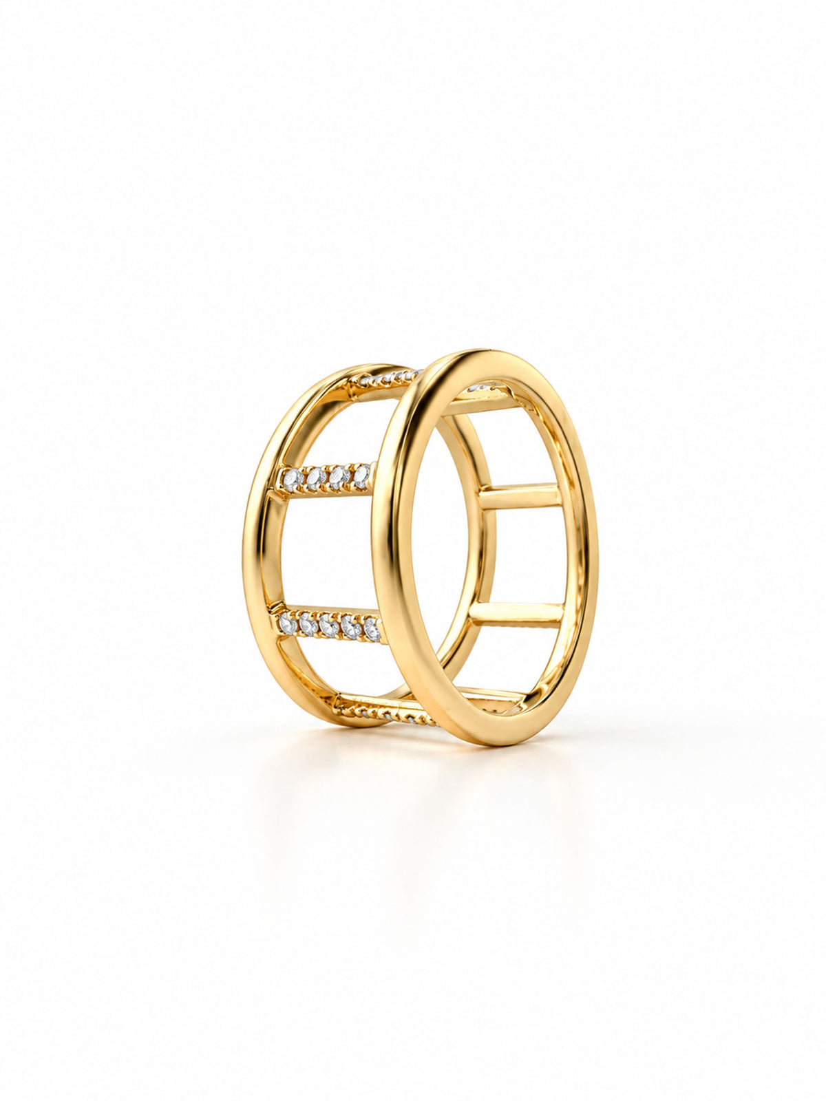 A gold openwork ring with a geometric, ladder-like circular design and rows of small clear stones set along the side bars, photographed on a clean white background.