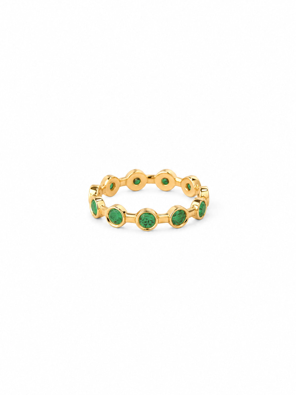 A gold chain-link ring featuring small round green gemstones set along the band, photographed on a clean white background.